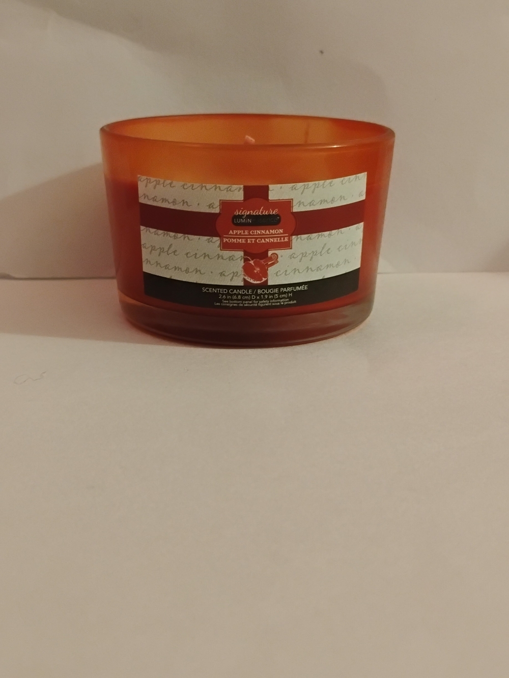 Signature Apple Cinnamon Scented Candle in Orange Glass